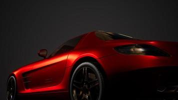 luxury sport car in dark studio with bright lights photo