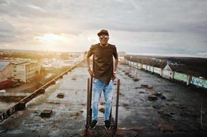 Portrait of  style black man on the roof photo