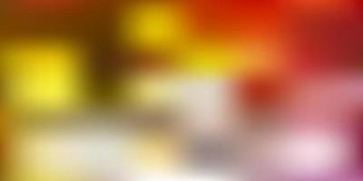 Light orange vector blur background.