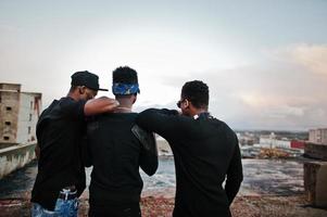 Three rap singers band on the roof photo