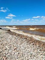 Rocky beach of lake or sea photo