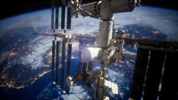 A view of the Earth and a spaceship. ISS is orbiting the Earth photo