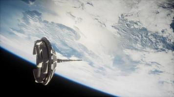 futuristic Space satellite orbiting the earth photo