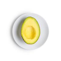 Creative layout made of avocado. Flat lay. Food concept. Avocado on white background photo