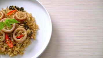 Homemade Basil and Spicy Herb Fried Rice with Squid or Octopus - Asian food style