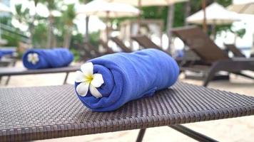 towel on beach chair - travel and vacation concept video