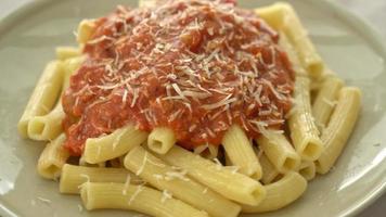 rigatoni pasta with pork bolognese sauce - Italian food style video