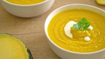 pumpkin soup in white bowl video