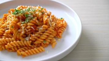 spiral or spirali pasta with tomato sauce and cheese - Italian food style video