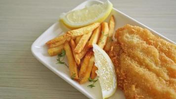 fish and chips on white plate video