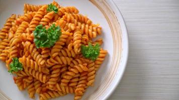 spiral or spirali pasta with tomato sauce and cheese - Italian food style video