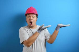 Fat Asian man wearing a helmet photo