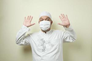 Asian muslim man wearing mask photo