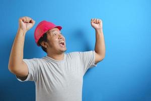 fat asian man wearing red helmet photo