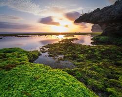 Sunset at indonesian beach photo