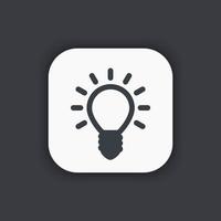 Shining light bulb vector icon