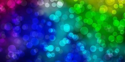 Light Multicolor vector background with spots.