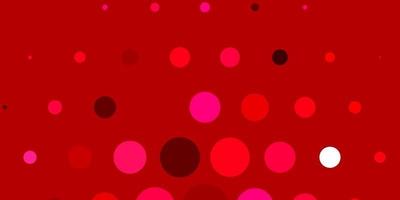 Light Red vector backdrop with dots.