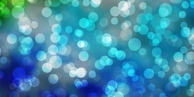 Light Blue, Green vector backdrop with dots.