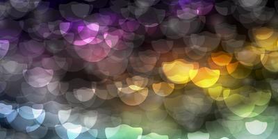 Dark Multicolor vector background with circles.