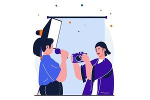 Photo studio modern flat concept for web banner design. Woman holding camera and taking a photos for posing female journalist with microphone in studio. Vector illustration with isolated people scene