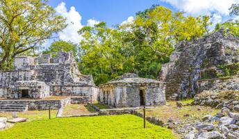 Ancient Mayan site with temple ruins pyramids artifacts Muyil Mexico. photo