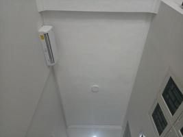 the ceiling of a house is white and clean photo