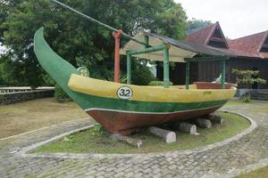 replica of a ship in a park photo