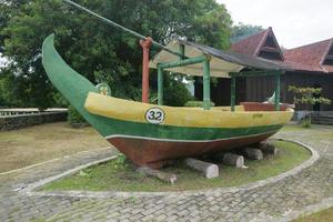 replica of a ship in a park photo