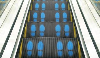 the escalator and foot print photo