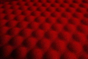 Red convex nylon fabric pattern texture background. photo