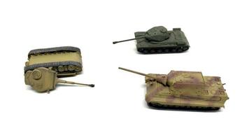 old toy tanks isolated on white background