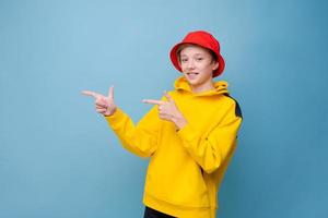 Pointing gesture to side with your finger. Rapper. Information banner. Stylish photo