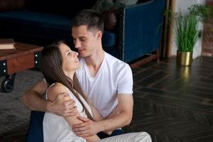 Beautiful happy couple, young husband and wife, romantic affectionate lovers photo
