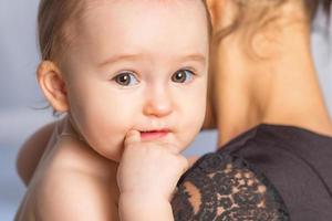 portrait of a cute little one-year-old girl photo