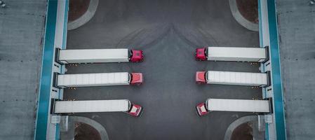 international logistics center with trucks top view photo