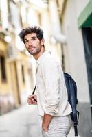 Young man sightseeing enjoying the streets of Granada photo