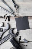 Work tools on a gray wooden background photo