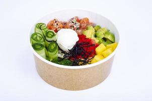 Poke with vegetables and fresh salmon. Studio Photo