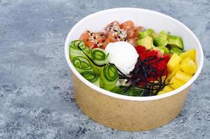 Poke with vegetables and fresh salmon. Studio Photo