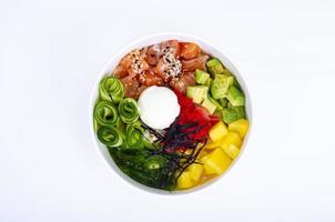 Poke with vegetables and fresh salmon. Studio Photo