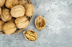 tasty Unpeeled walnuts, background, texture. Studio Photo