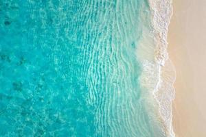 Top view aerial photo from drone of stunning beautiful sea landscape beach with turquoise water with copy space for your text. Beautiful sand beach with turquoise water. Relax nature, amazing beach