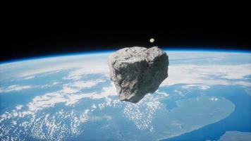 asteroide peligroso acercándose al planeta tierra video