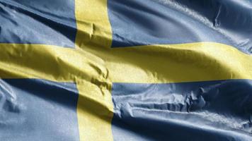 sveriges textilflagga vajar på vindslingan. svensk banderoll vajar på vinden. tyg textilvävnad. full fyllning bakgrund. 10 sekunders loop.