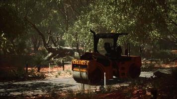 road roller tractor in the forest video