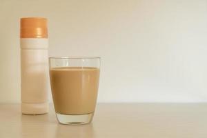 coffee latte glass with ready to drink coffee bottles photo