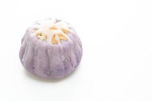 taro bun with white sugar cream and nut on white background photo