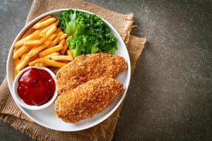 fried chicken breast fillet steak with french fries photo