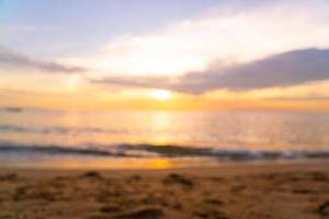 abstract blur beautiful tropical beach and sea with twilight sky at sunset times photo